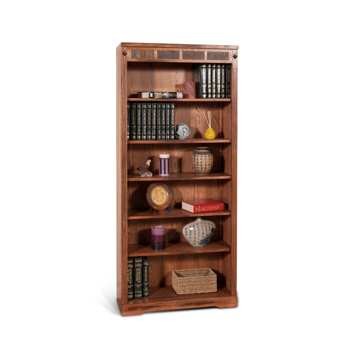 Sunny Designs Sedona 72"H Bookcase 2952RO2-72 setup with books and items on adjustable shelves