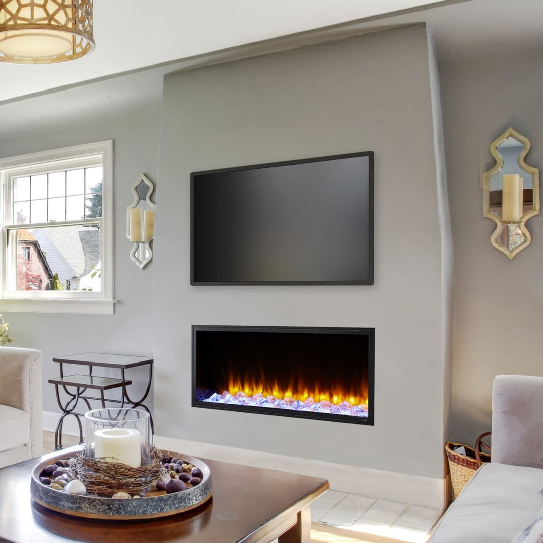 SimpliFire 55" Scion linear built-in electric fireplace SF-SC55-BK with orange flames, crystal media, and in a living room
