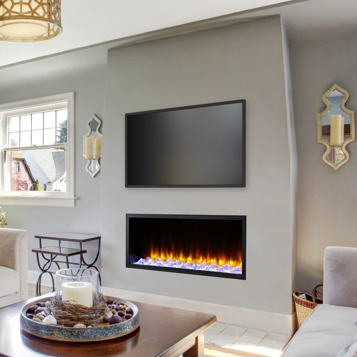 SimpliFire 55" Scion linear built-in electric fireplace SF-SC55-BK with orange flames, crystal media, and in a living room